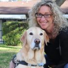 Lorri Bernson with her guide dog Carter