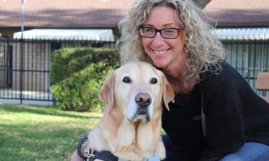 Lorri Bernson with her guide dog Carter